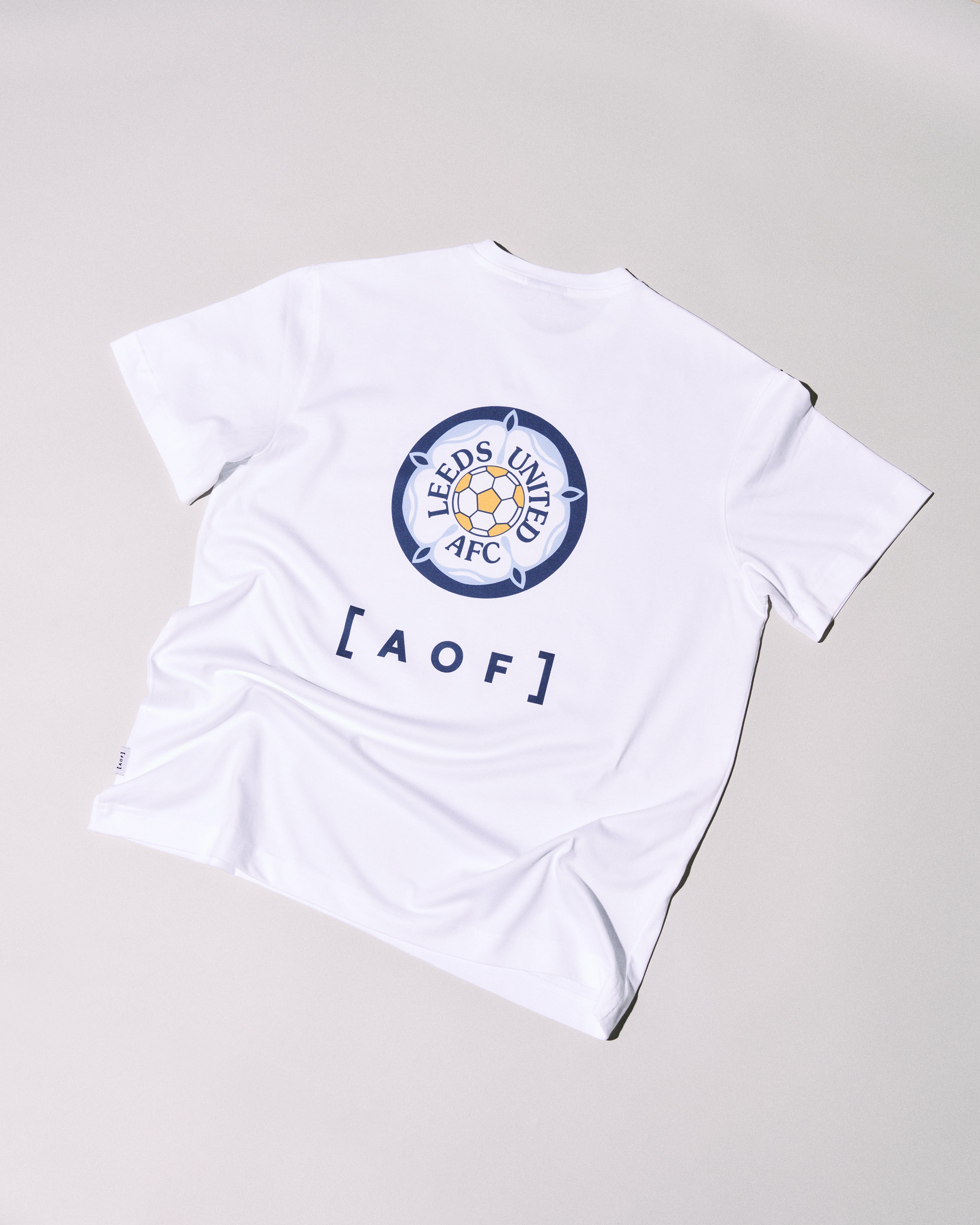 AOF x Leeds 90s Crest Tee | White Graphic T-shirt | Art of Football